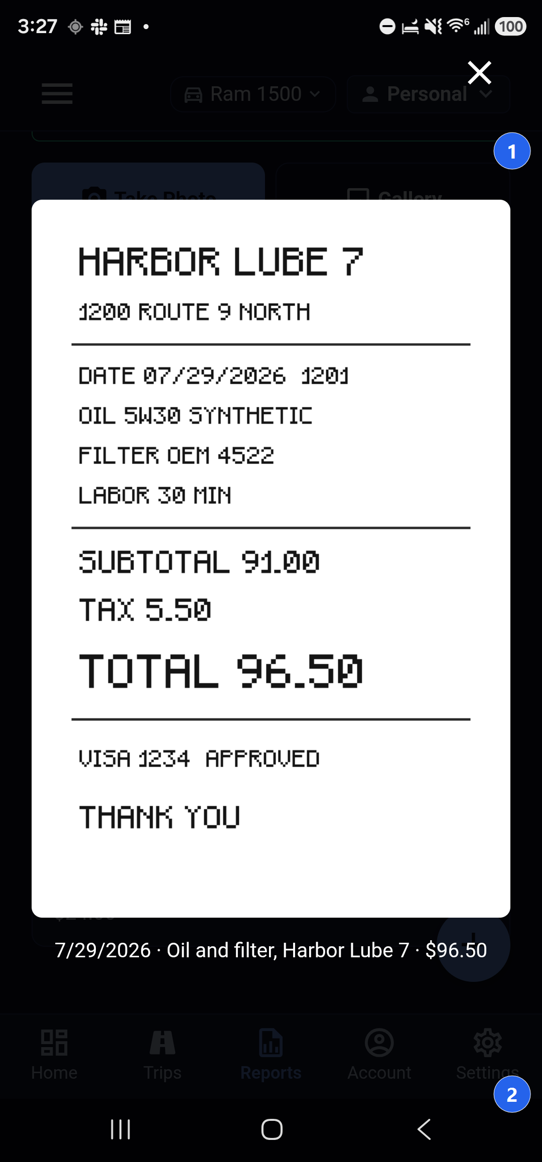 A saved receipt open full screen in Backbuild Miles, showing a legible printed receipt from Harbor Lube 7 with a total of 96 dollars 50. Callout 1 marks the close cross at the top right. Callout 2 marks the caption underneath the photograph reading 7 slash 29 slash 2026, Oil and filter, Harbor Lube 7, 96 dollars 50.