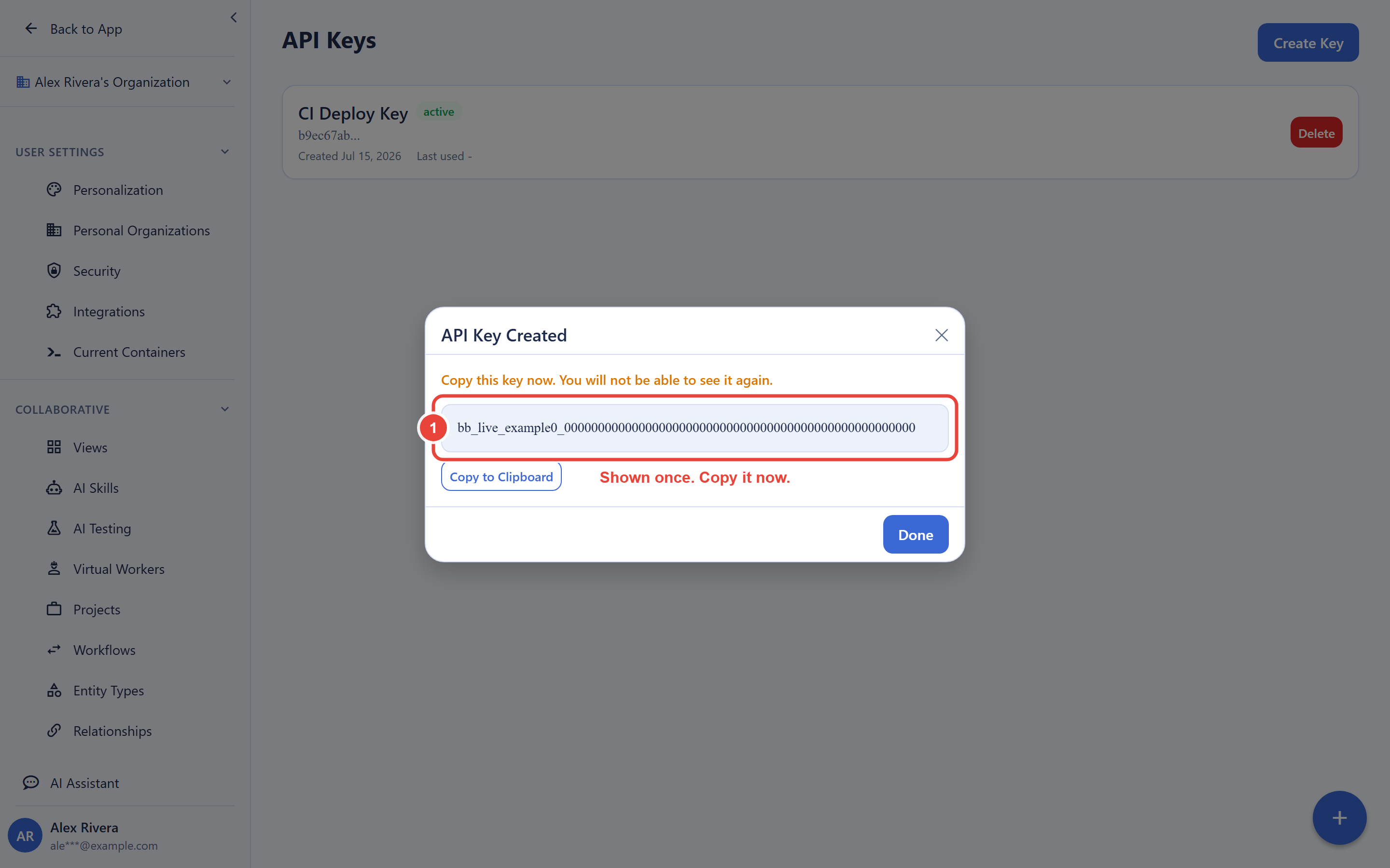 The API Keys settings screen right after creating a key. The API Key Created dialog shows the new key value highlighted, with a warning that it is shown only once, a Copy to Clipboard button, and a Done button. The Create Key button is visible at the top right of the screen behind the dialog.